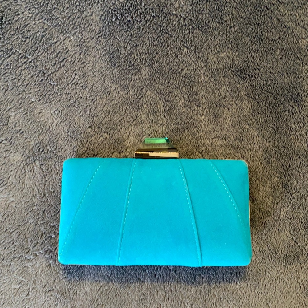 LIKE NEW turquoise clutch with strap